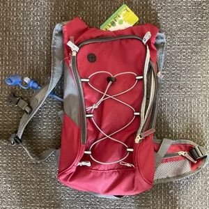 Hiking backpack with solar charger panel and water pouch